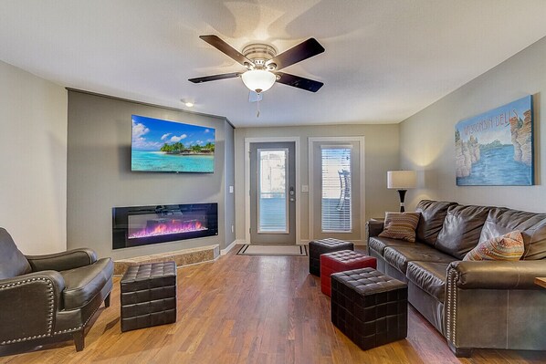 Large Roku TV and fireplace in family room