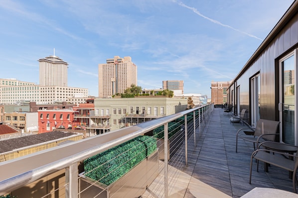 Extra long balcony with cozy seating. Perfect for morning and evening relaxing!