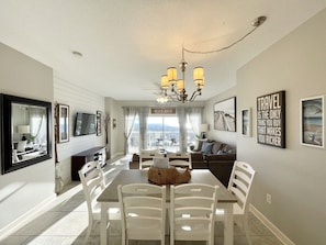 We recently updated the dining table, chairs, bar stools, accent pillows, art work, rug and lighting. We also mounted the TV for a more modern and organized look! We hope you enjoy these improvements.