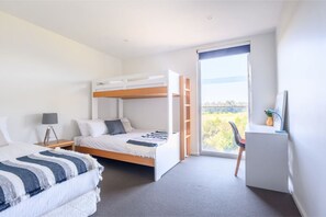 [Bedroom] Double bed, top single bed and a separate king single bed. This room sleeps 4 people