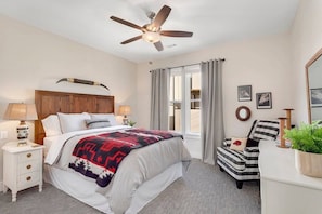 Upstairs, enjoy a fan favorite bedroom! This bedroom features a plush Queen-size bed and southwestern decor.