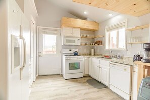 Kitchen with access to private deck