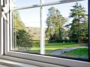 Charming view of the garden from the living room | Chinkwell - Wooder Manor, Widecombe-in-the-Moor, near Bovey Tracey
