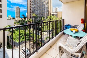 Balcony with city and ocean views