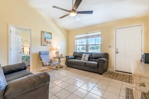 Living room with high ceilings and extra seating
