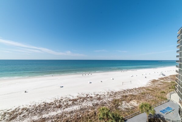 Step out onto your private balcony for beach views in every direction!