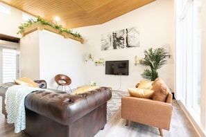 Living room with floor to ceiling windows