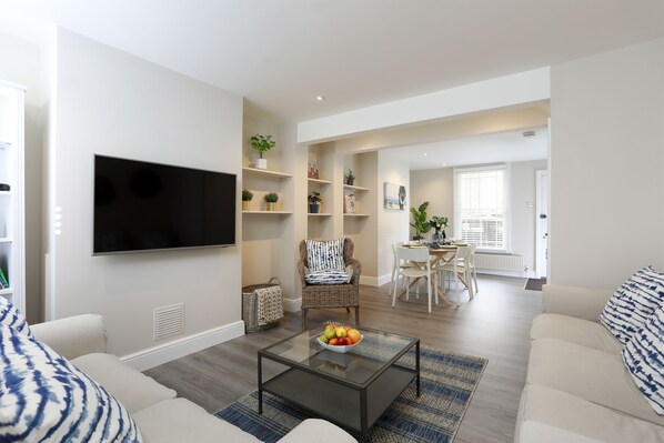 Open plan sitting room and dining area.
