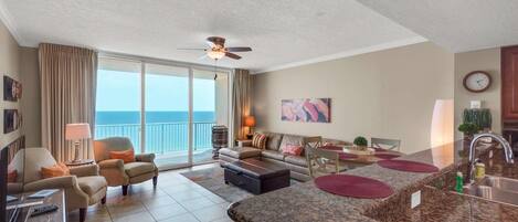 Spacious living room and dinning area with gulf views.