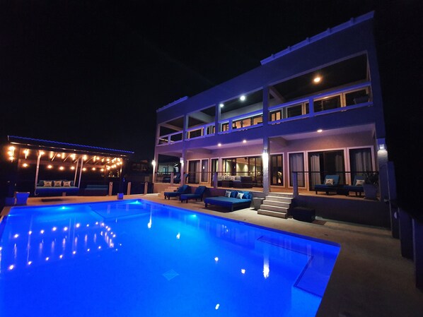 The new 38'x21' salt water pool and patio at night.