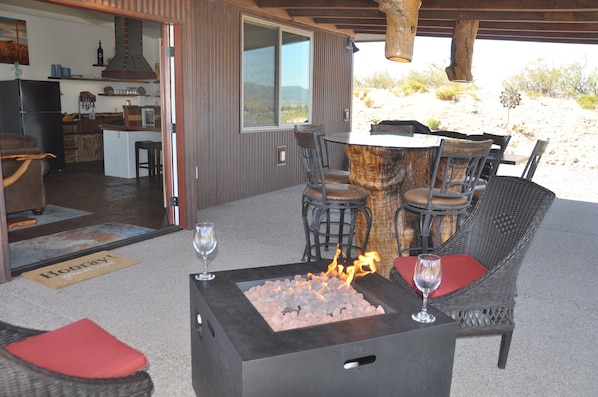 Enjoy the outdoor gas fireplace in the evening while watching a gorgeous sunset.