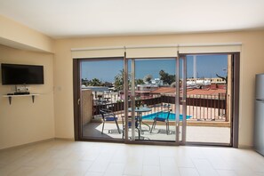 Patio Doors leading to the balcony and seating area