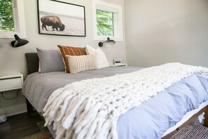 queen Casper mattress, black-out blinds, and noise-canceling insulation