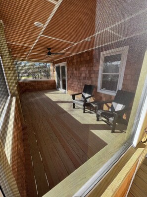 Screened in front porch. 
