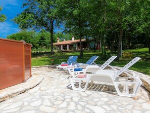 Plant, Furniture, Table, Building, Chair, Tree, Outdoor Furniture, Door, Sky, Outdoor Table