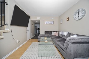 Large 65" Smart TV to watch your favorite apps.