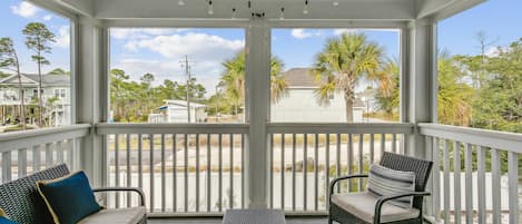 Relaxing screened in balcony, is a great retreat for your morning coffee or evening glass of wine!