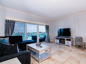 Flat screen TV accompanies beach view