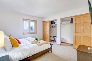 Window has blackout curtains even though they are not pictured