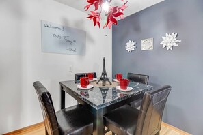 Dining space allows you to enjoy meals your own way.  Use the whiteboard for work needs or fun