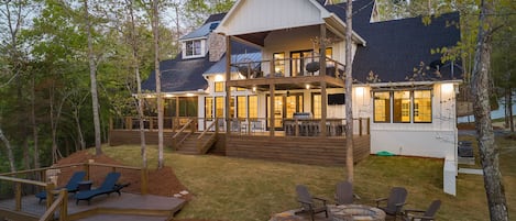 Generous outdoor entertaining spaces, with two levels of decks and a fire pit