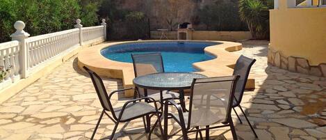 Property, Patio, Swimming Pool, Flagstone, Furniture, Table, Outdoor Table, Backyard, Chair, Tile