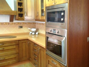 Countertop, Cabinetry, Furniture, Room, Kitchen, Property, Drawer, Hardwood, Wood Stain, Cupboard