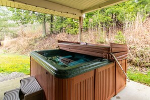 A third outdoor seating option next to the hottub offers complete seclusion.