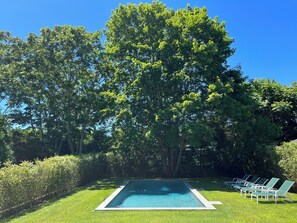 Relax amidst lush, professionally landscaped, quiet, and private grounds.