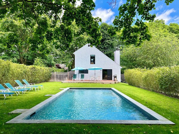 Swim, lounge, BBQ, & dine by the lovely, private, heated, gunite swimming pool.
