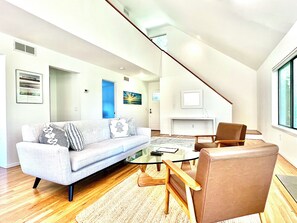 Bright, light living room with mid-century modern furnishings