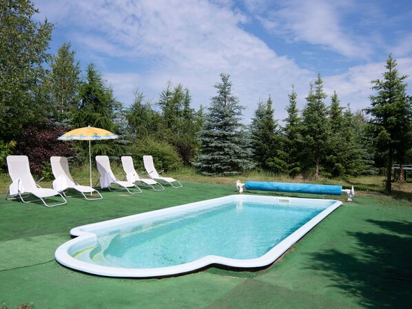 Water, Sky, Cloud, Property, Swimming Pool, Nature, Azure, Tree, Body Of Water, Grass