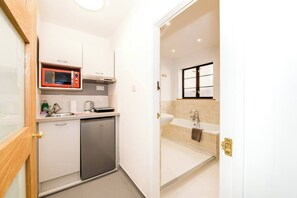 Surprise your partner with a nice breakfast from this cozy kitchenette