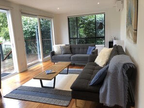 Second living room with Desk/ TV and foldout couch (Convertible to bed)