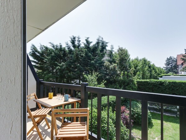 Sky, Plant, Table, Property, Building, Fence, Chair, Shade, Wood, Tree