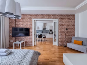 Bedroom with a street view - view to the dining room