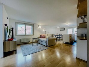 Living room with sofa and dining table