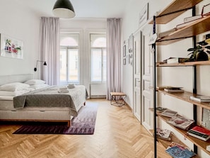 Bedroom no.1 with windows facing the street