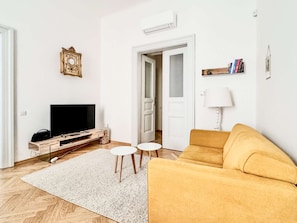 Living room with sofa and smart TV