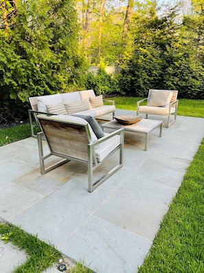 brand new blue stone patio and seating
