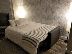 The couch converts into a sofa bed with mattress memory foam topper.