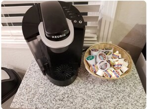 Keurig coffee maker and various coffee pods to get your morning going!