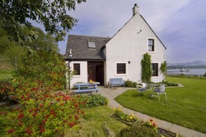 Lochside farmhouse with stunning sea views.