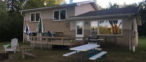 View of the house from the yard (waterside).
Picnic table available for use.