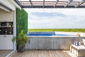 Private rooftop pool with incredible views of Tulum National Park. (1)
