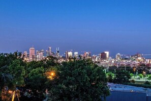 This home boasts an amazing private rooftop with downtown views and plenty of space to spread out and relax.