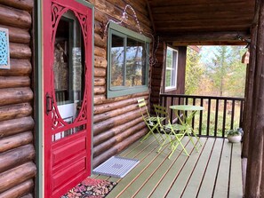 Relax and lounge in this nice covered deck overlooking Kootenay Lake