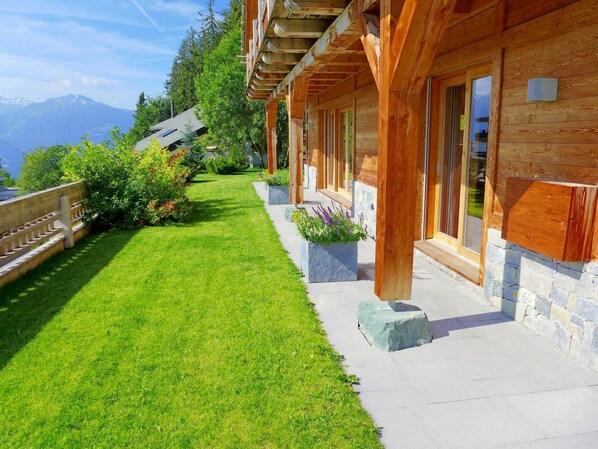 Plant, Property, Green, Building, Sky, Wood, Shade, Flower, Cottage, Tree