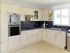 Cabinetry, Countertop, Furniture, Room, Kitchen, Property, Major Appliance, Interior Design, Floor, Cupboard