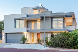 A modern architectural gem in a peaceful Old Dunsborough street, welcoming you to your coastal escape.